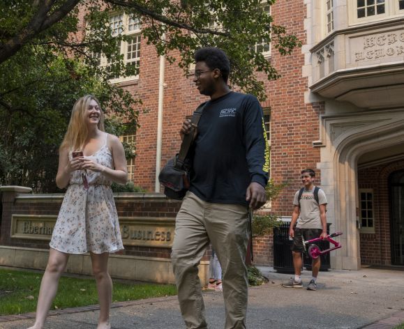 students walking together outside Weber Hall